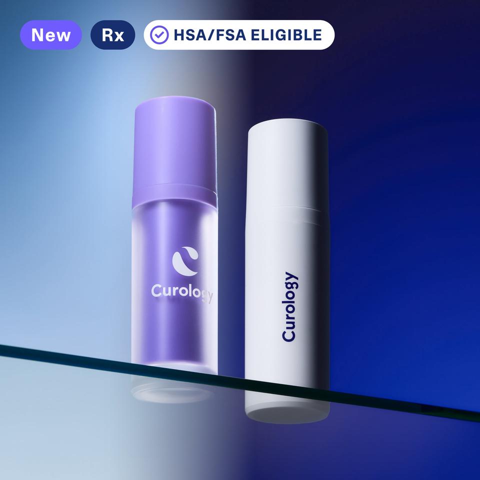 Curology DayPrimeᴿˣ and Custom Formulaᴿˣ personalized acne treatments sit atop a glass shelf