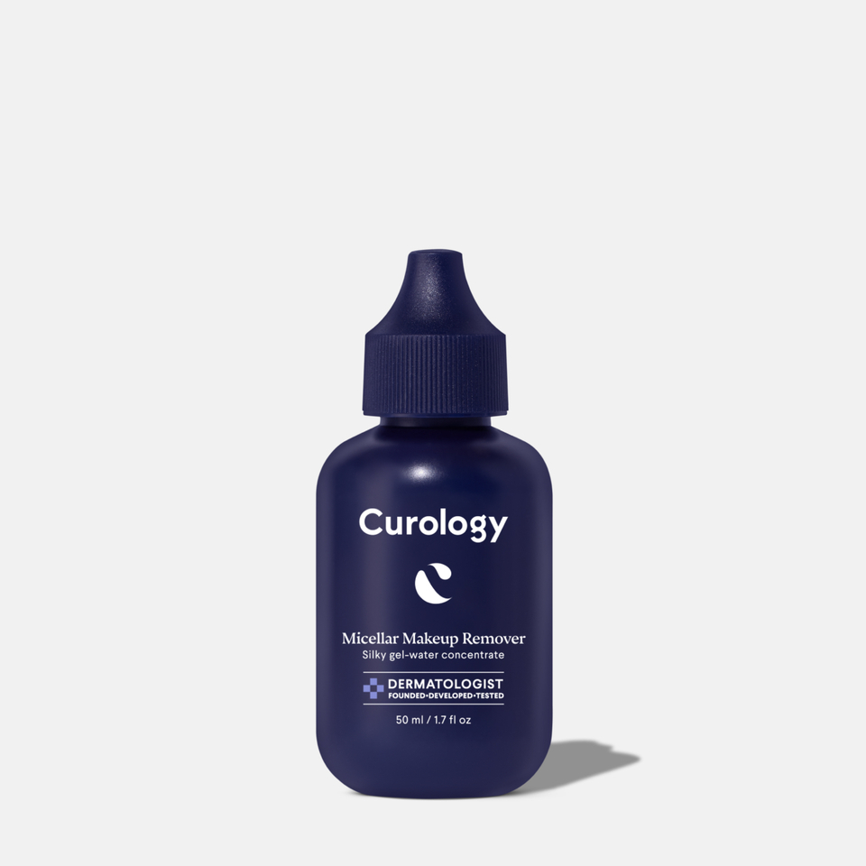 Curology Micellar Makeup Remover in a dark blue squeeze bottle with pointed applicator tip, labeled ‘Silky gel-water concentrate,’ dermatologist founded, developed, and tested.